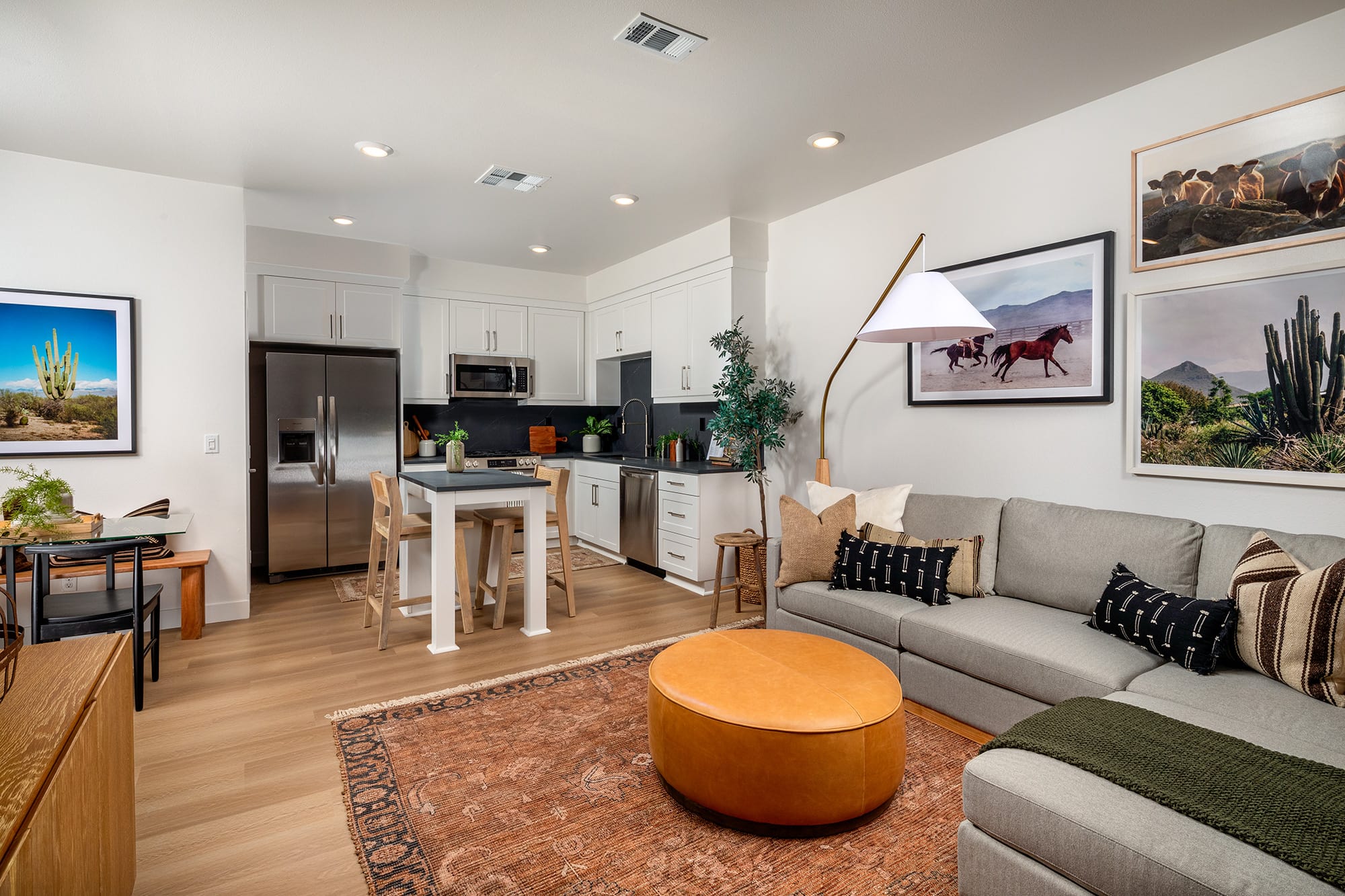 Open-concept living room and kitchen at Mason at Epoca, new-build townhomes for rent in San Diego